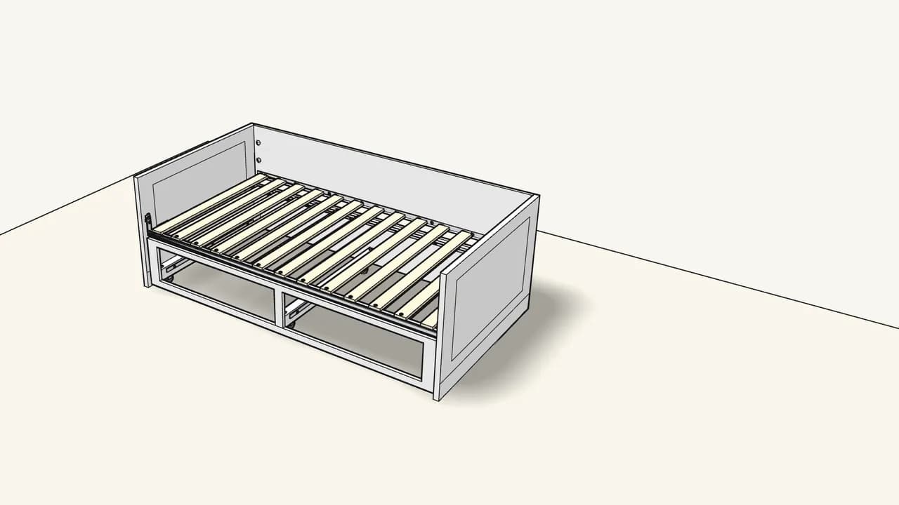 Step 21: Lift the frame over the pull-out bed and lower it down. — IKEA BRIMNES assembly